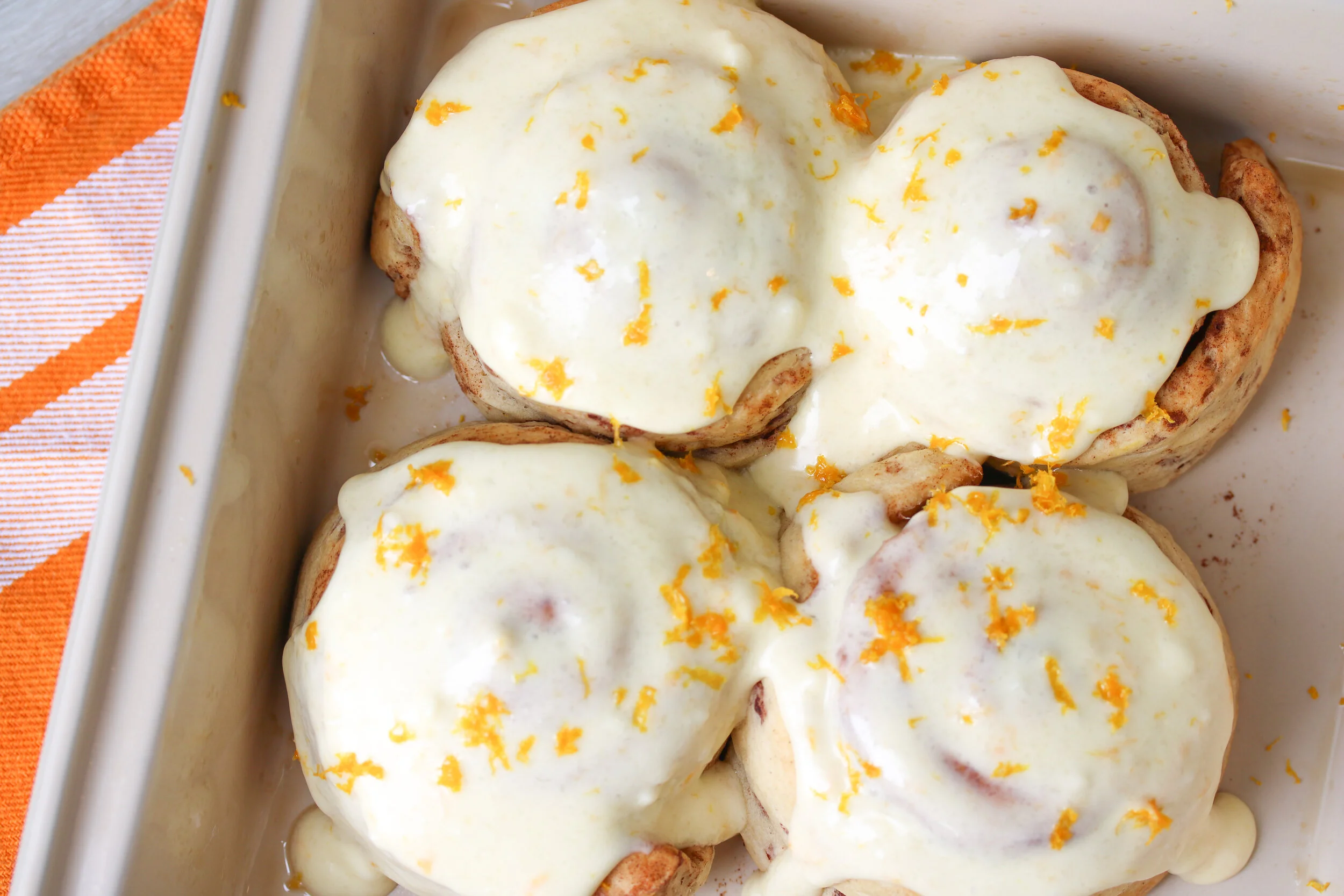 Orange Cream Cheese Frosted Cinnamon Rolls