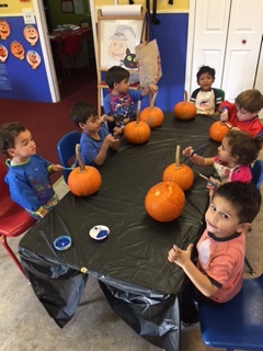 painting our pumpkins 
