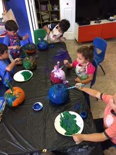 painting our pumpkins