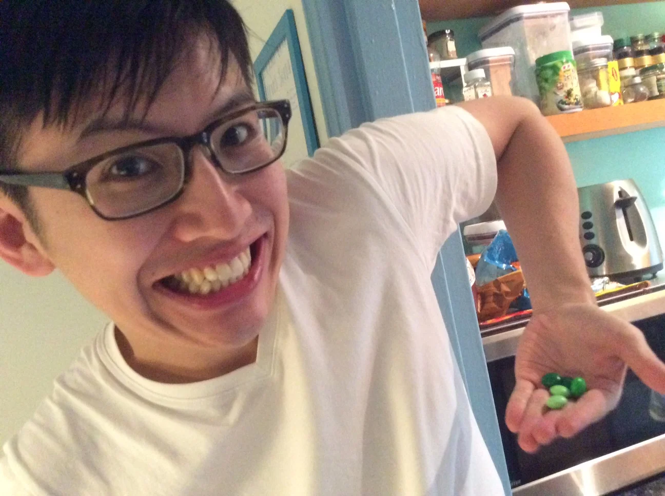 Home sweet home — Wayne's kitchen doorway. Having followed us through one month, two continents, and three countries, the M&Ms allow themselves to be finished off.