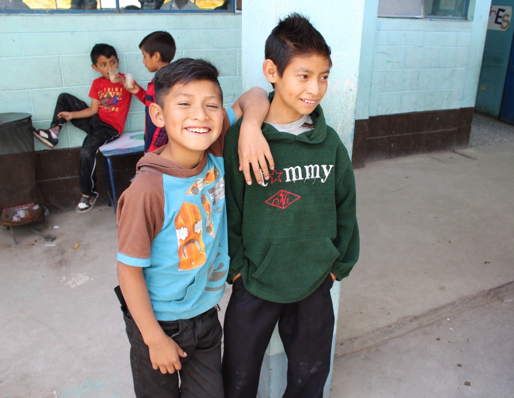 Primary school students in Tierra Colorada Baja wait outside the mobile clinic.