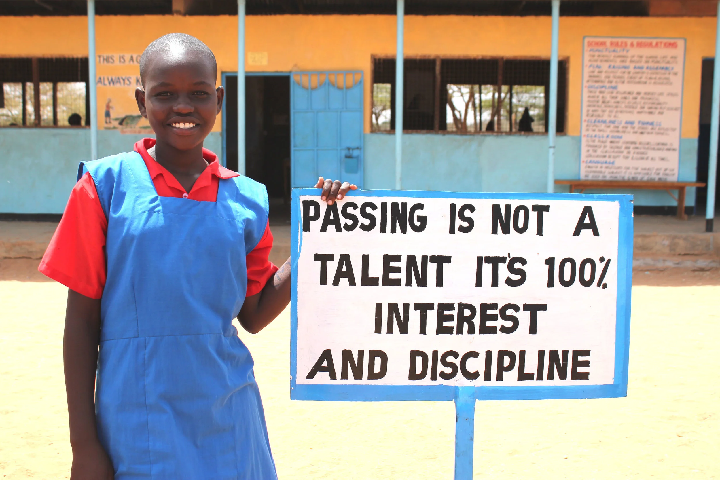 I am Pauline Kangai.