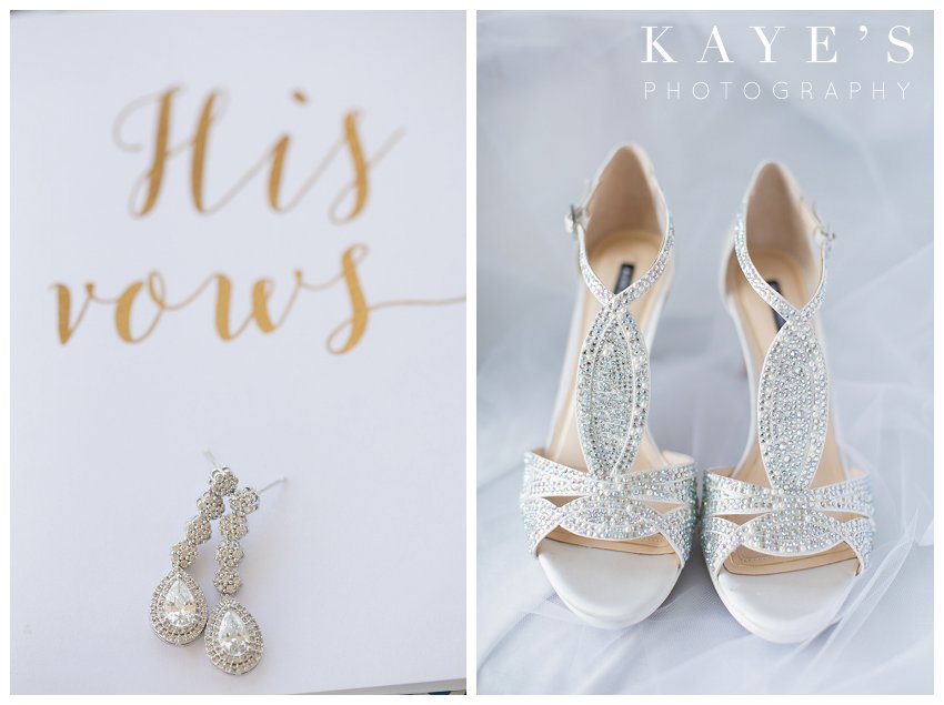 Earrings on vow book and brides shoes in Flint Michigan during wedding 