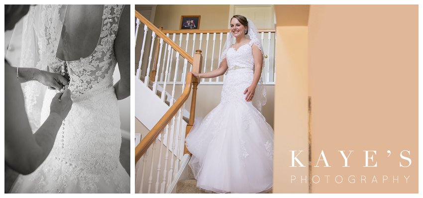 Bride putting on gown with help then walking downstairs in Flint Michigan during wedding