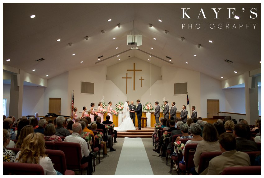 Bride and Groom at the altar during wedding ceremony in Flint Michigan