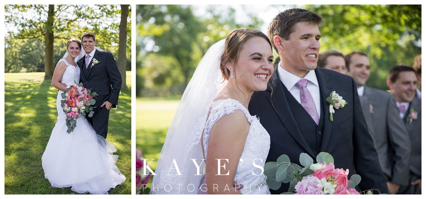 Bride and Groom posing for pictures during their wedding in Flint Michigan