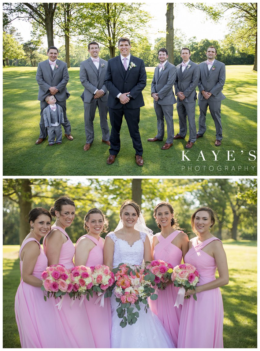 Bride and groom with the wedding party during photographs in Flint Michigan