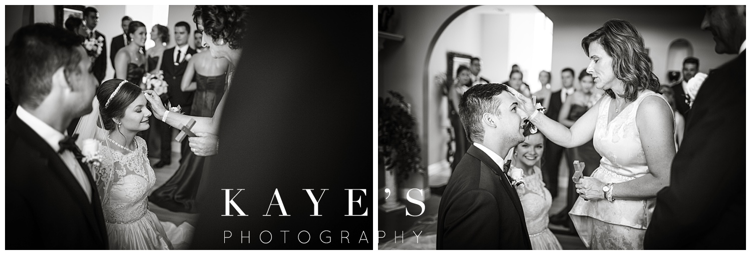 blessed by parents during a polish wedding by kayes photography