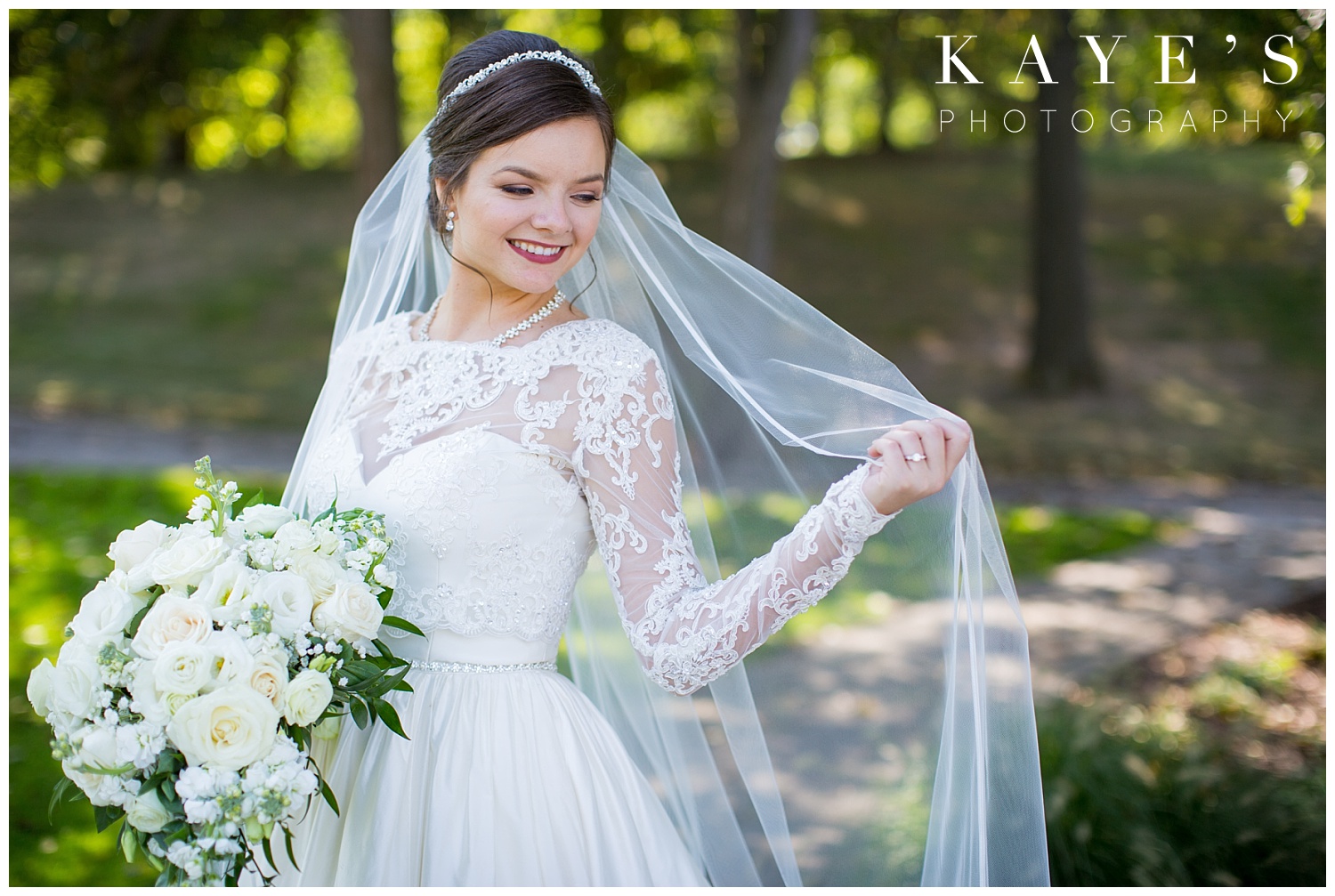 bride posing on wedding day at palazzo grand with kayes photography