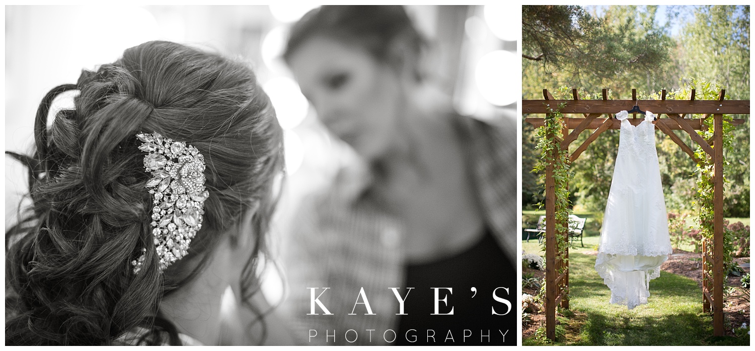 wedding dress hanging with hair and makeup on wedding day with kayes photography