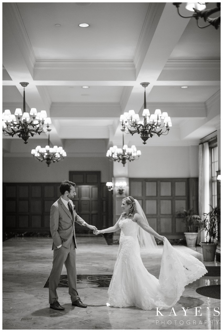 bride and groom dancing in the entry way of royal park hotel on wedding day