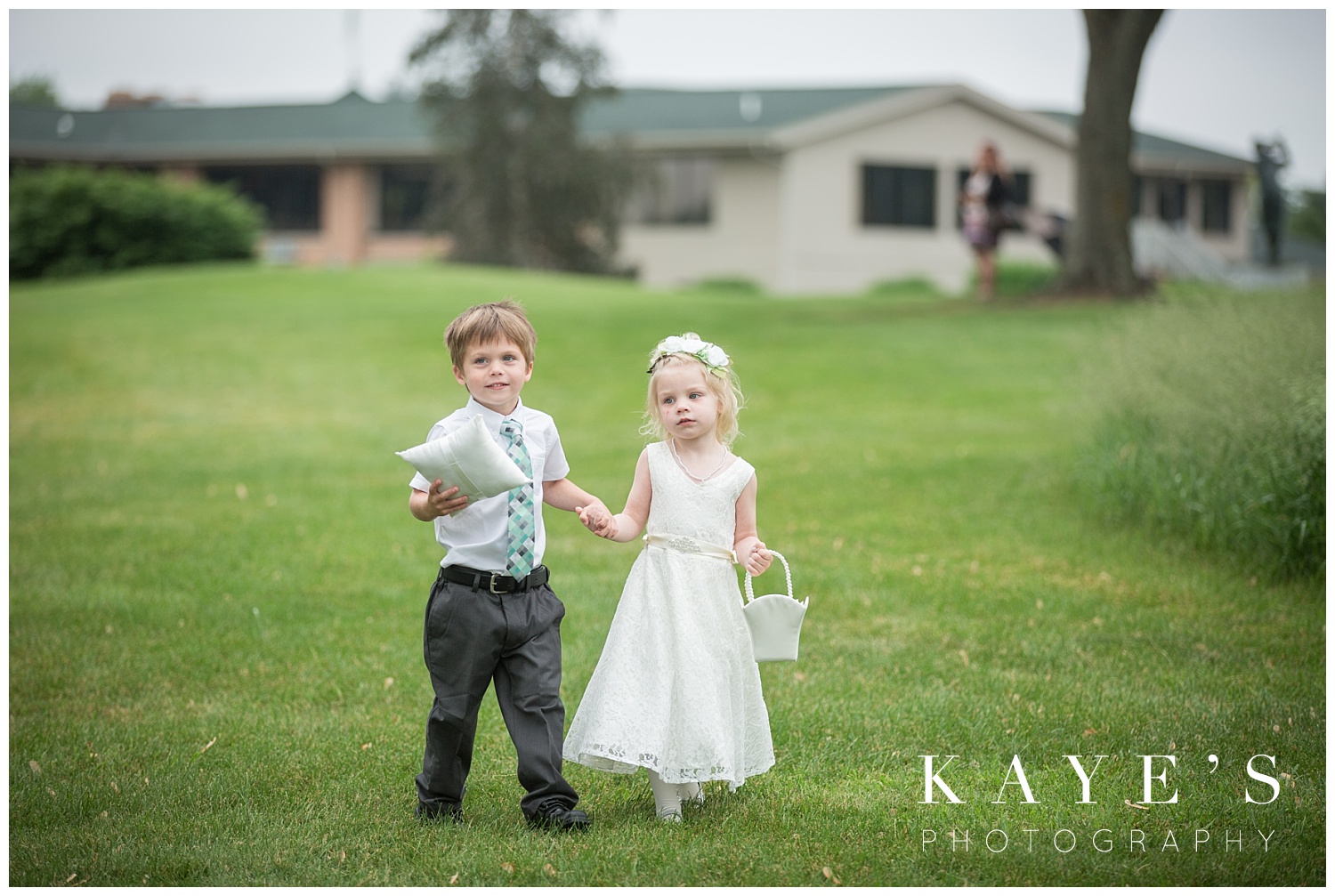 flower girl and ring bearer at a same sex wedding by Kaye's photography