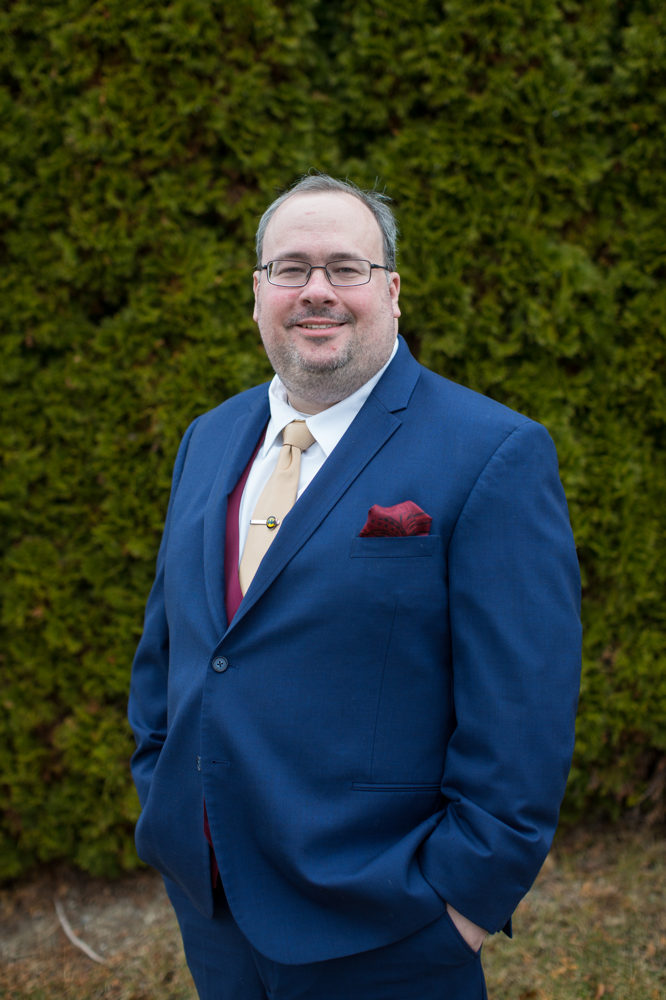 groom pictures during winter wedding in Sterling Heights, Michigan