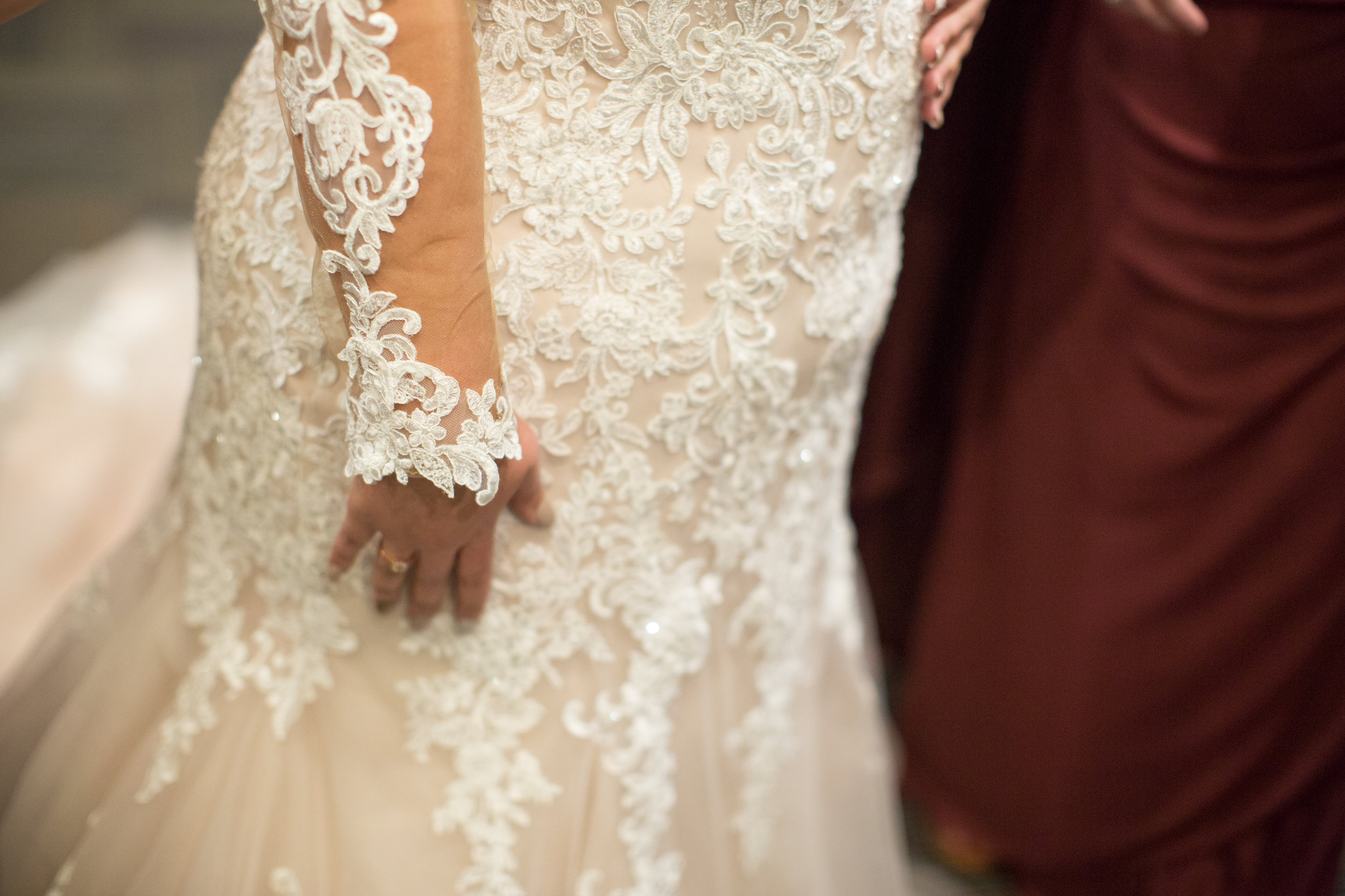 details of bride dress in a winter wedding in sterling heights michigan