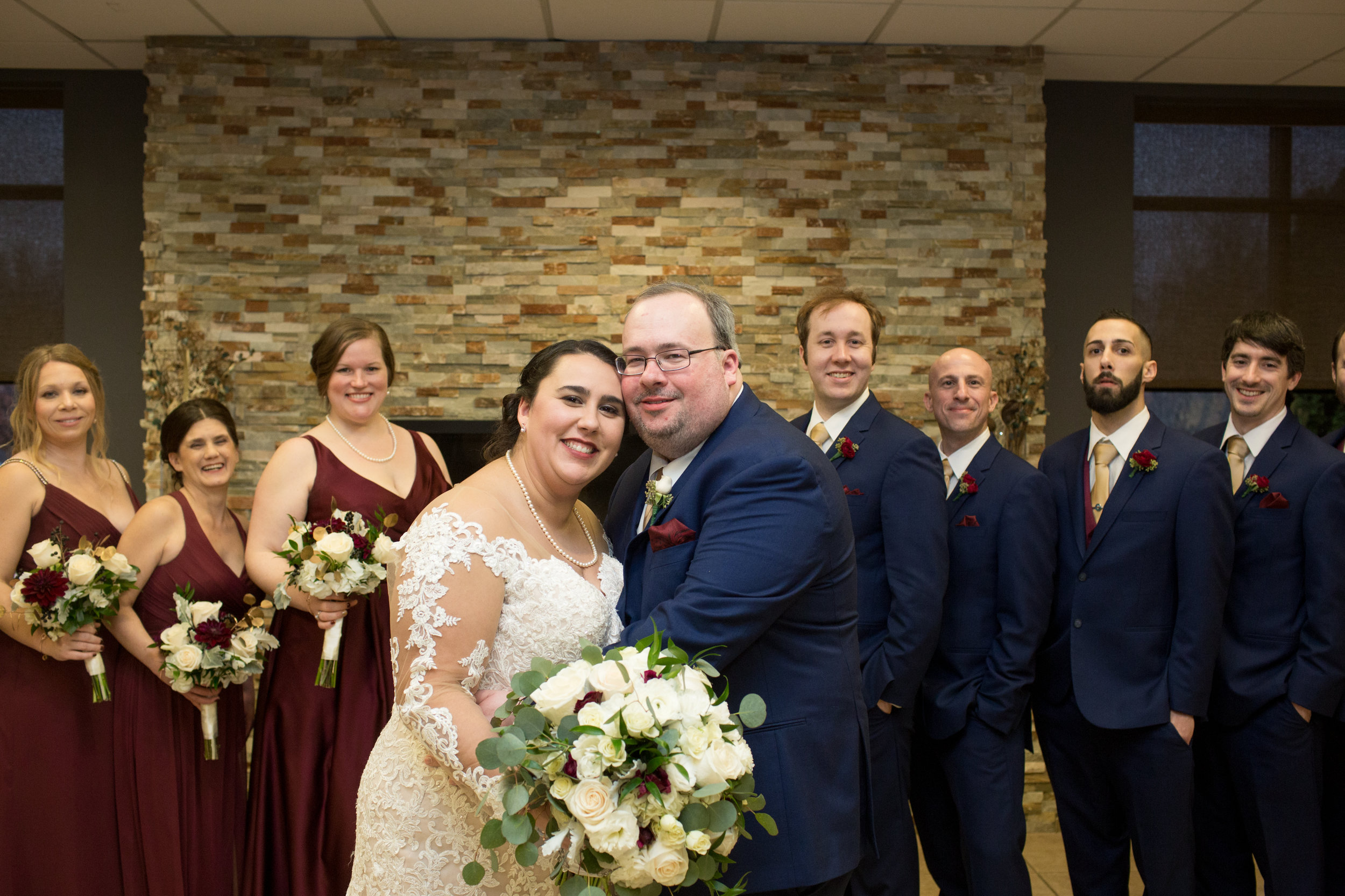 Bride and groom wedding pictures after ceremony at club venetian in sterling heights michigan