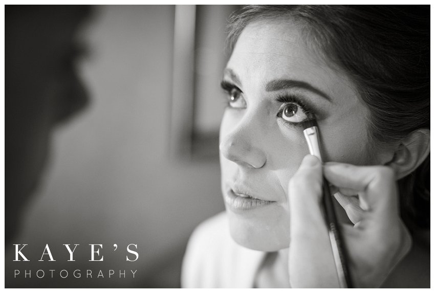 bride getting ready before crystal gardens michigan wedding