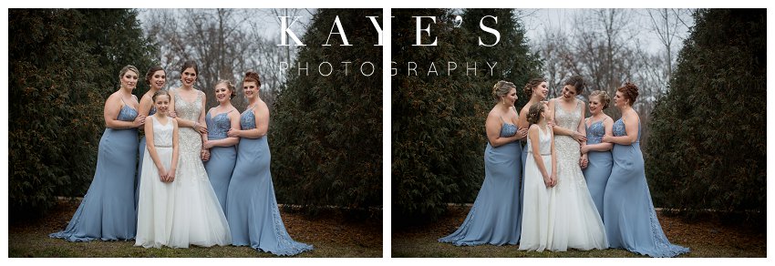 bride with bridesmaids during winter wedding in brighton, michigan