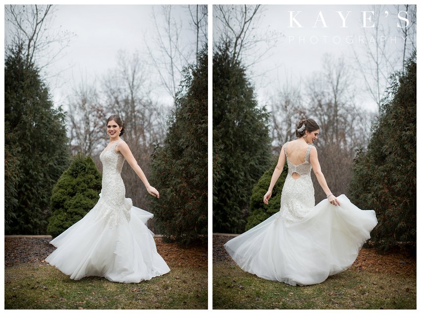 bride posing for winter wedding for crystal gardens in howell michigan