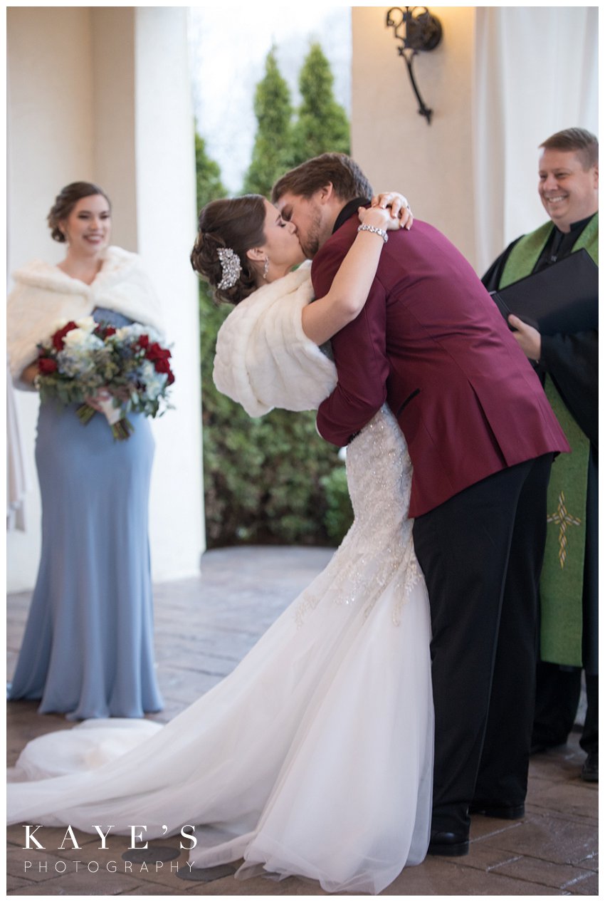 first kiss during ceremony of crystal gardens wedding