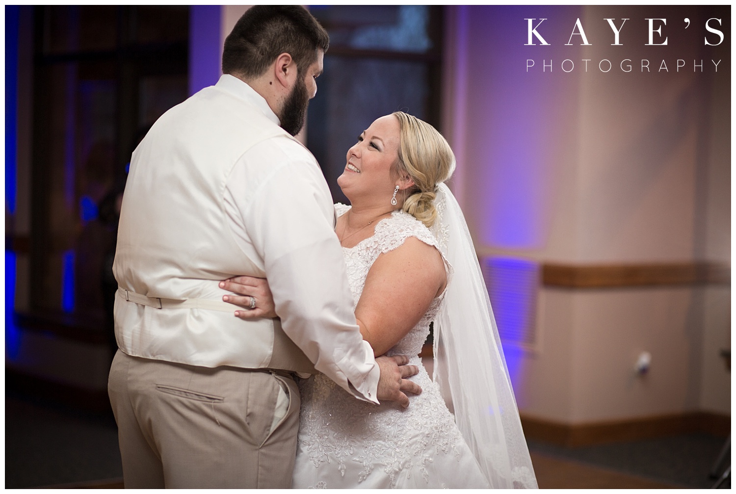 first dance for bride and groom during reception at lapeer country club by kayes photography