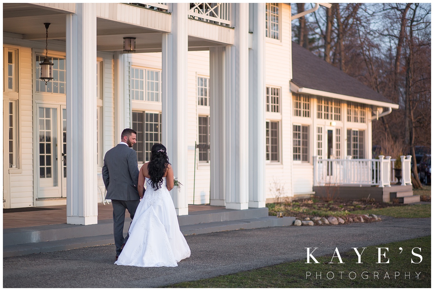 sunset wedding photos by howell michigan in front of waldenwoods