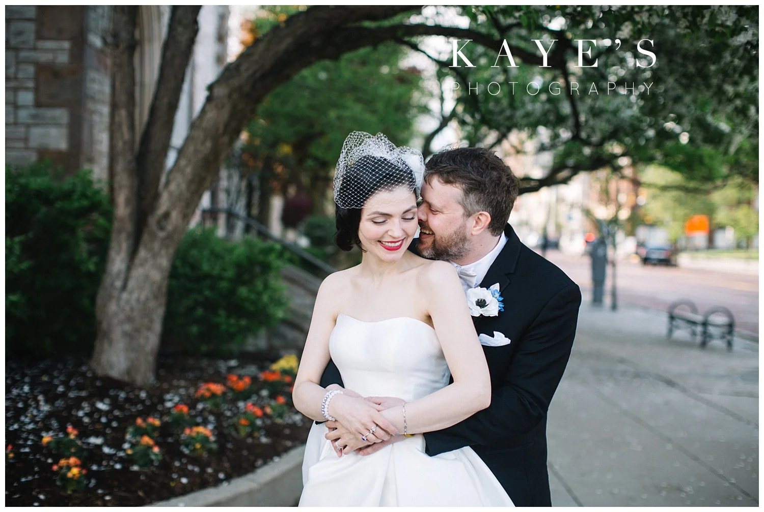 bride and groom wedding photos together in the city after wedding ceremony