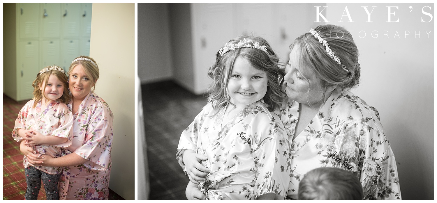 bride and flower girl before wedding getting ready in flushing michigan
