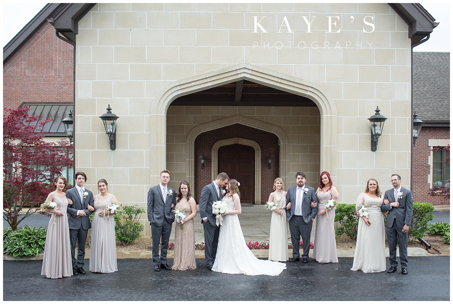 bridal party standing in front of warwick hills for wedding portraits