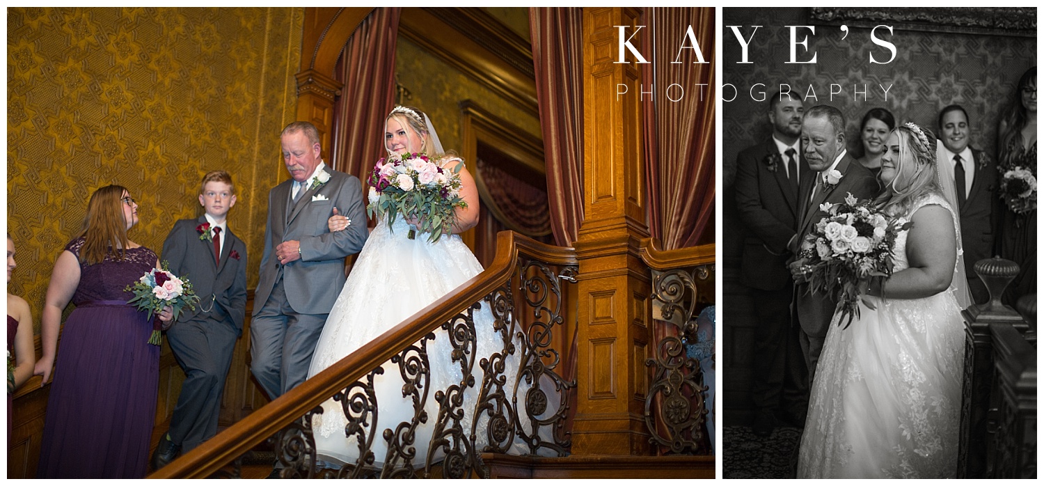 bride walking down the stairs to the ceremony at the Whitney