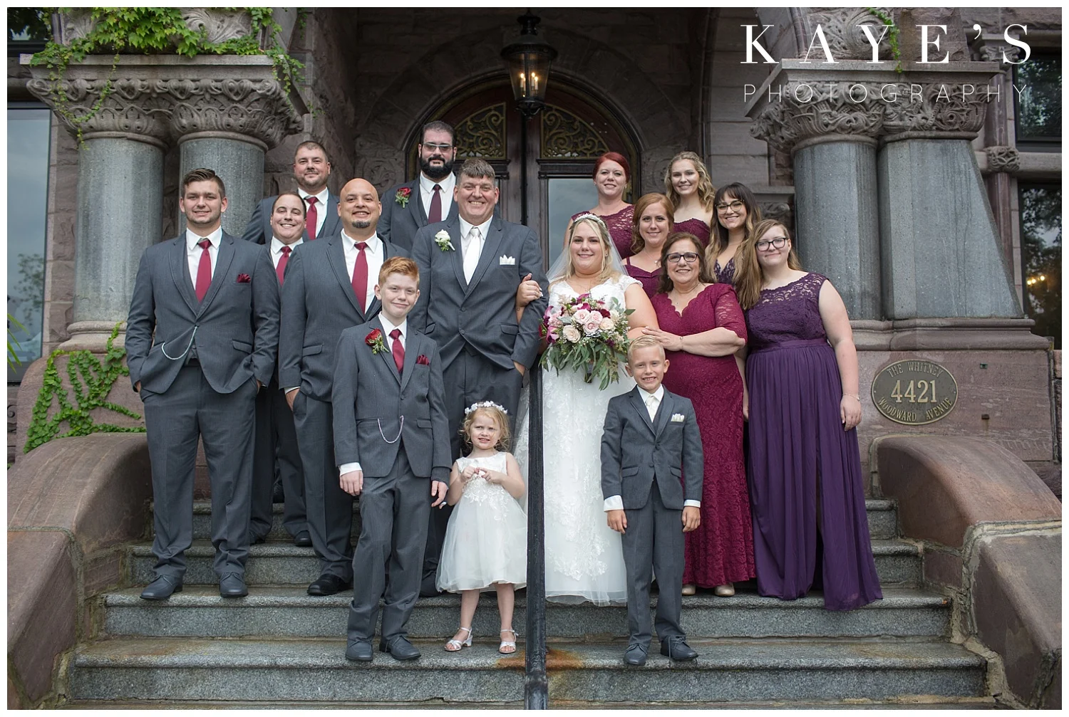 bridal party portraits in front of the whitney in detroit michigan