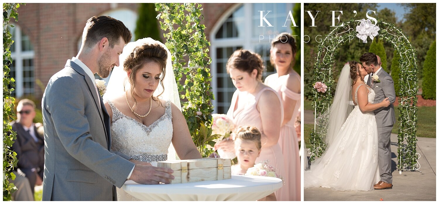bride and groom's first kiss in grand blanc michigan wedding
