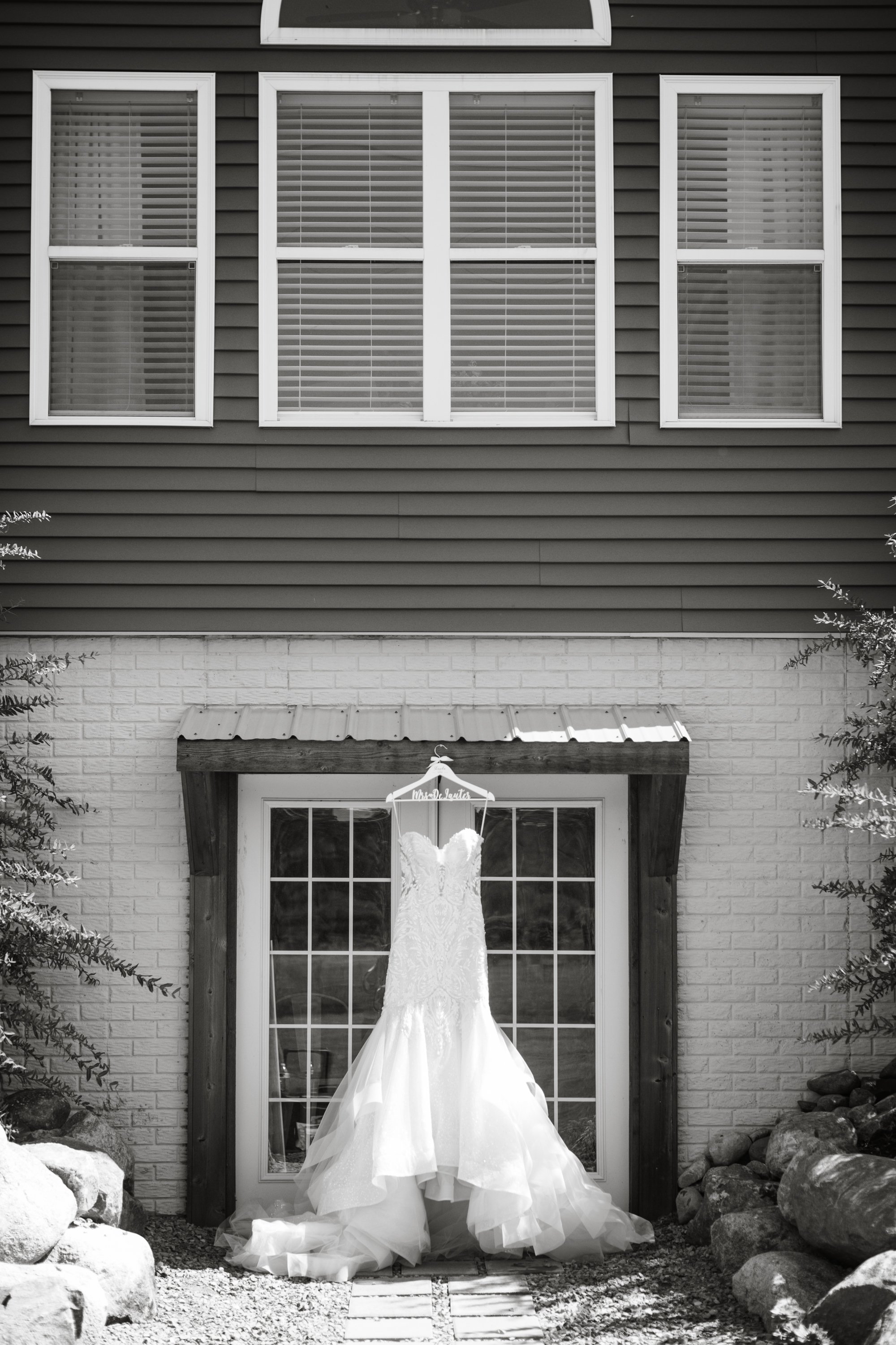 brides dress hanging at Meadow wood acres in morrice, michigan