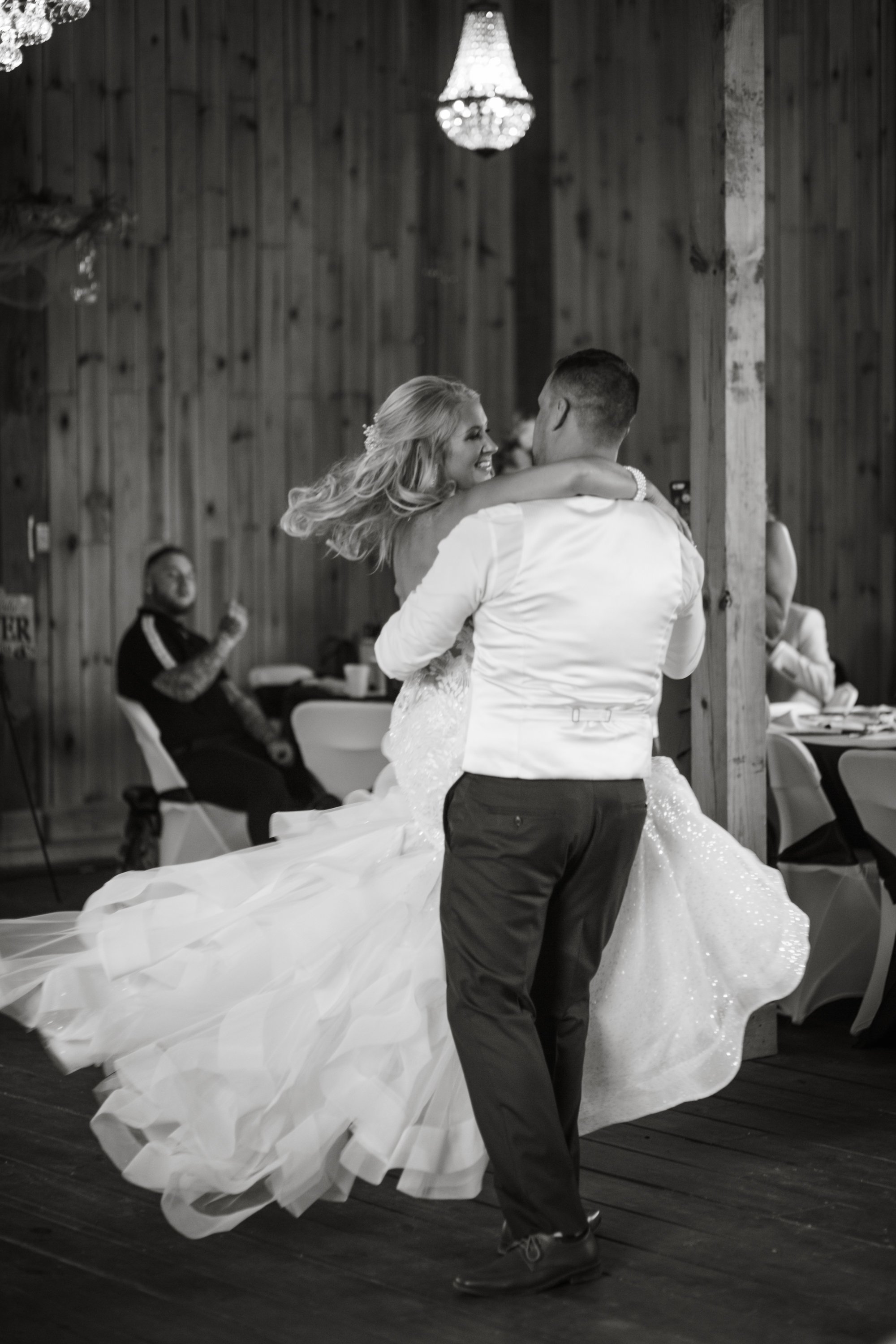Bride and groom dancing in their first dance by Kaye's photography