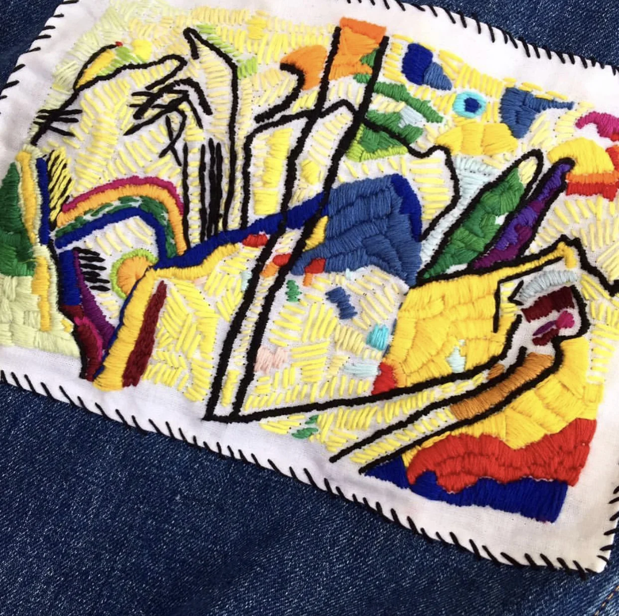 Wassily Kandinsky’s “Composition IV” hand embroidered on vintage fabric then stitched on the back of a denim jacket