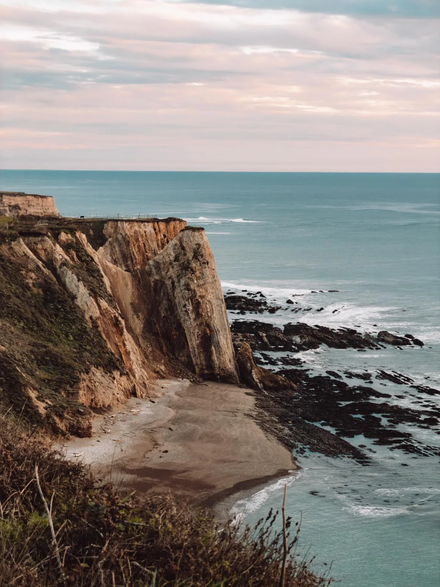 Beyond the initial splash of moving, this year became the quiet ripples of settling into calling these shores home.

Soft pastels in the early hours&mdash;on streets, shutters, and layered across the bay. Quiet, steady footsteps on gravel as first li