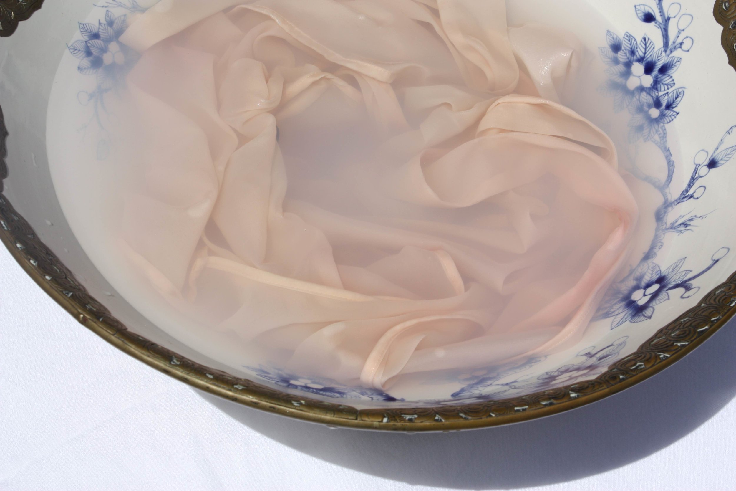 Bowl of soapy water close-up.jpg