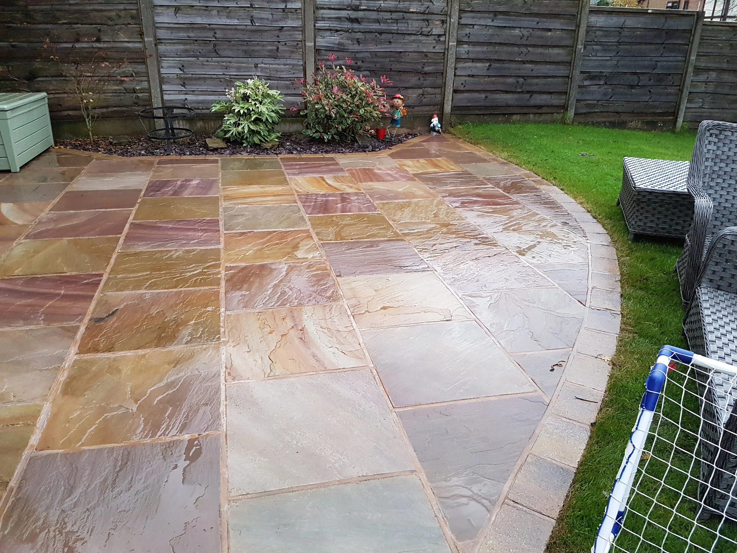 Softwash treatment on Indian stone patio in Rawtenstall.