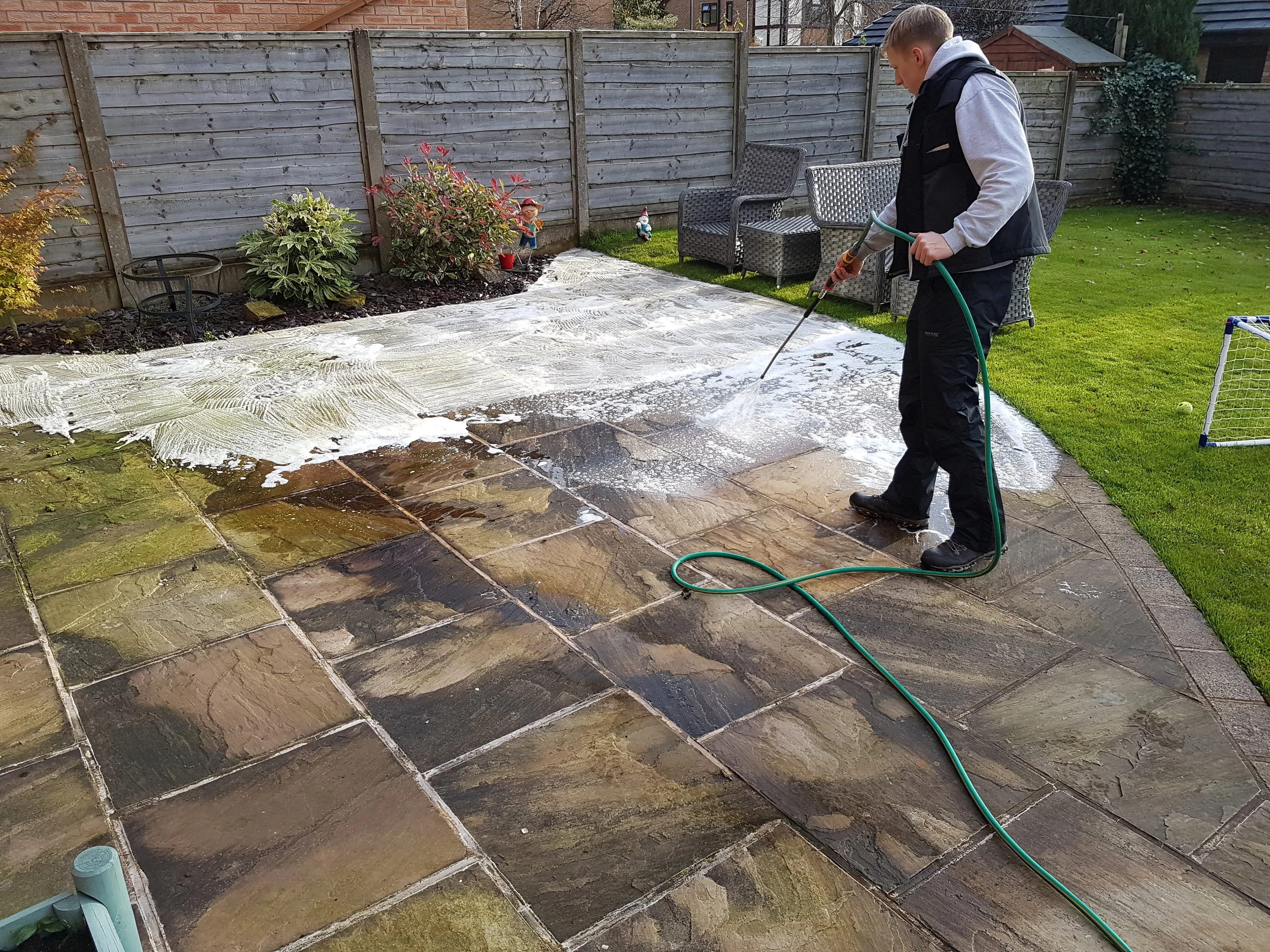 Softwash treatment on Indian stone patio in Rawtenstall.