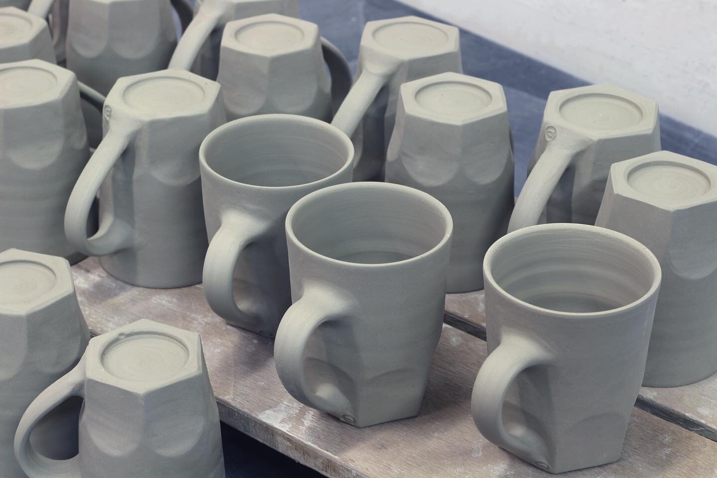 Finished mugs with the final step being the small lug of clay backfilling the handle to soften the appearance of the join.
The mugs are thrown with 450grams of clay, which feels excessive for there scale, but the reason being is the amount needed tha