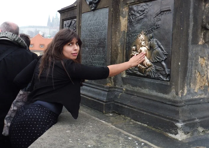  Touching the plaque of St John of Nepomuk. Photograph: Charlotte Roper