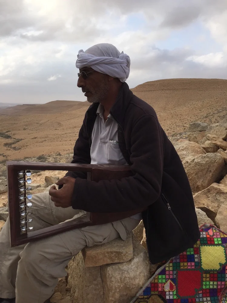 Anad Maneizi playing the sumsumia Photo by Andy Teirstein