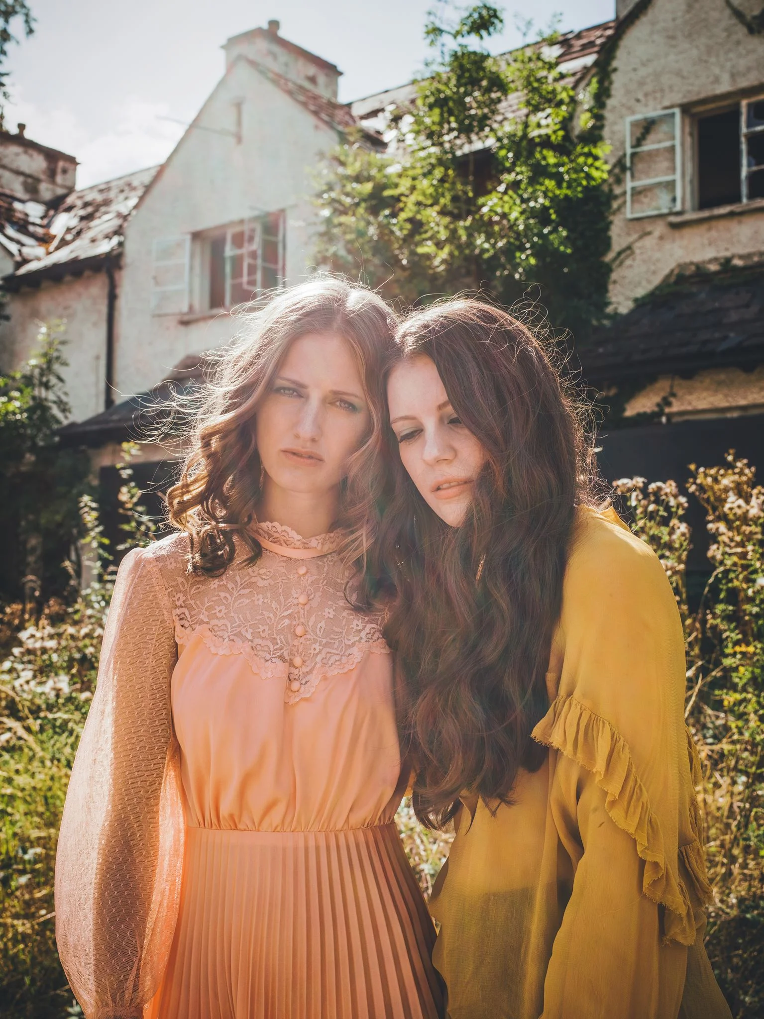 Hannah wears vintage dress from Beyond Retro, Dalston. Abigail wears top and trousers from Zara.