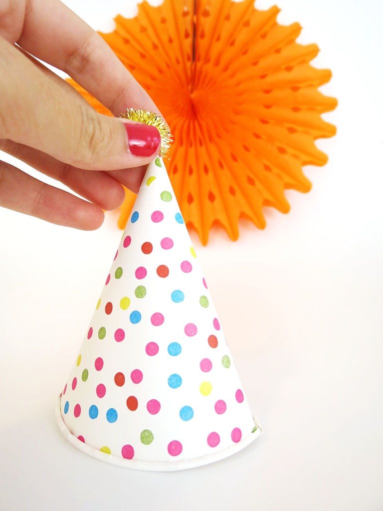 This isn't a regular hat- it's a cool hat! They're cheap and easy to make, and make really cute festive accessories. Click to check out the easy how-to!