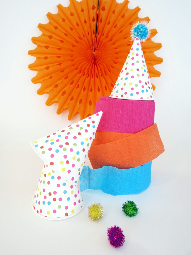This isn't a regular hat- it's a cool hat! They're cheap and easy to make, and make really cute festive accessories. Click to check out the easy how-to!