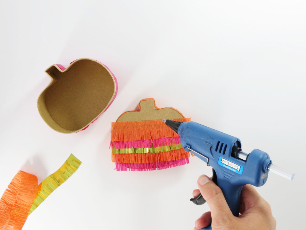 I love a good piñata, but the thought of making them from scratch seemed a bit daunting and time consuming, especially for something that would be torn apart. That's when it hit me- faux piñatas! All the cuteness and fun of a piñata, made in half the time, that can be kept indefinitely. Win-win! Click for the full tutorial.