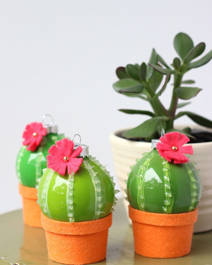 Ornaments are easily the best part of any tree. We know there are so many cool ornaments you can buy, but over in these parts, we like things you can make! I've rounded up the best colorful ornament DIY's so that your tree can be as vibrant and fun as you are. Click to see all the ornaments.