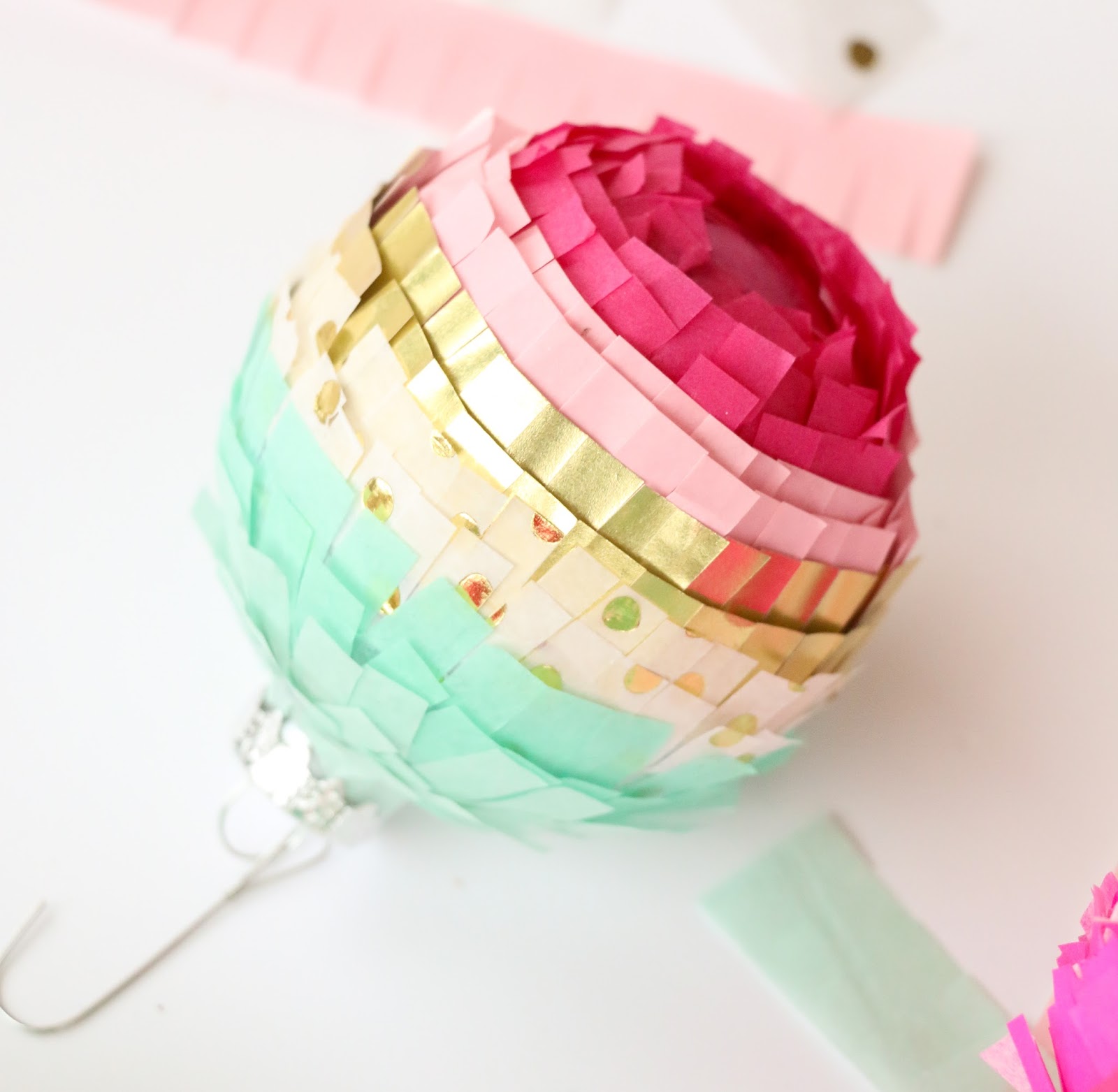 Ornaments are easily the best part of any tree. We know there are so many cool ornaments you can buy, but over in these parts, we like things you can make! I've rounded up the best colorful ornament DIY's so that your tree can be as vibrant and fun as you are. Click to see all the ornaments.
