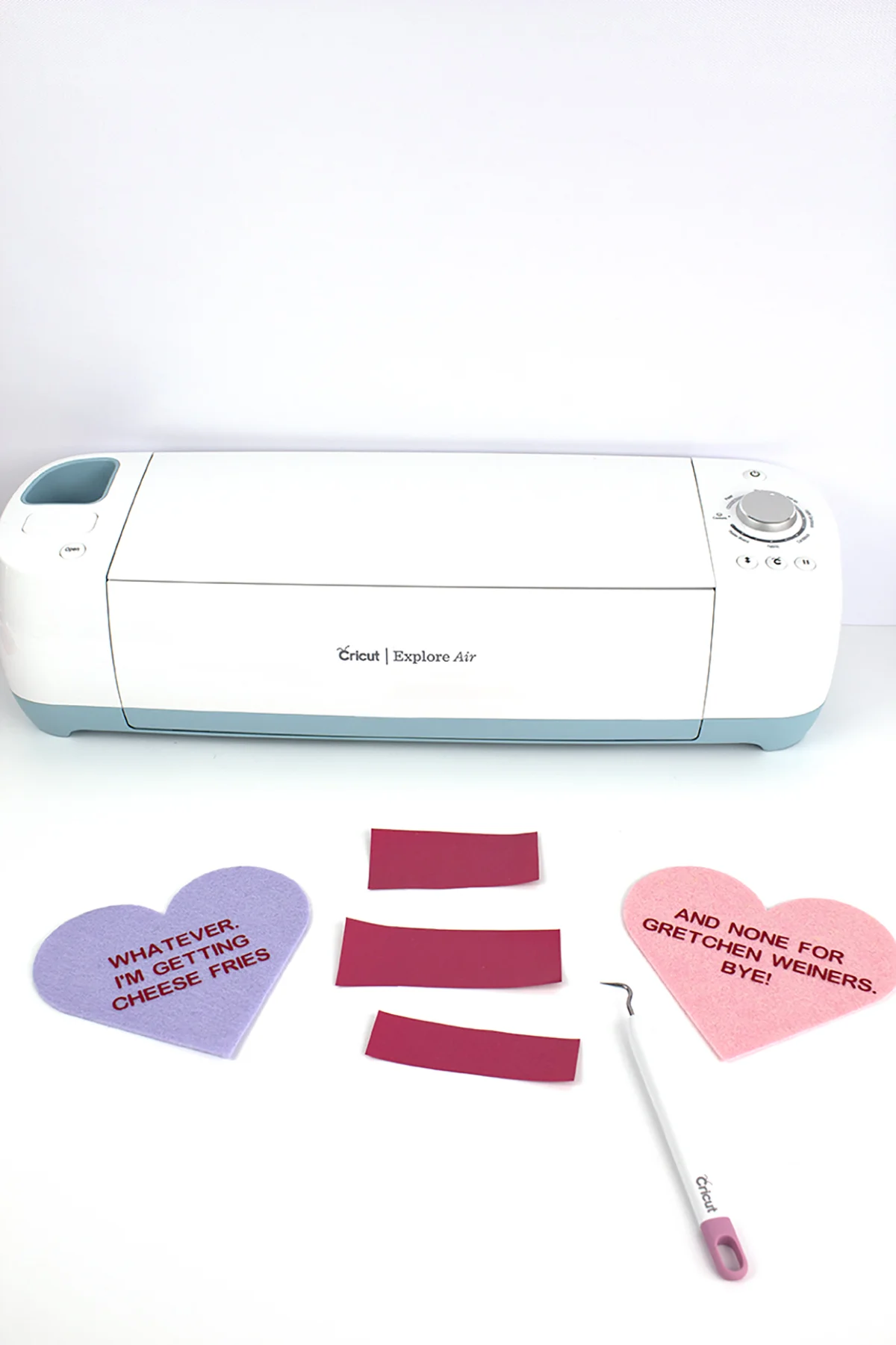 Cricut iron-on vinyl is actually pretty simple to use, as long as you know which way the vinyl goes and how to make sure your letters aren't backwards. Click for the full tutorial, along with how to make some Mean Girls conversation hearts!