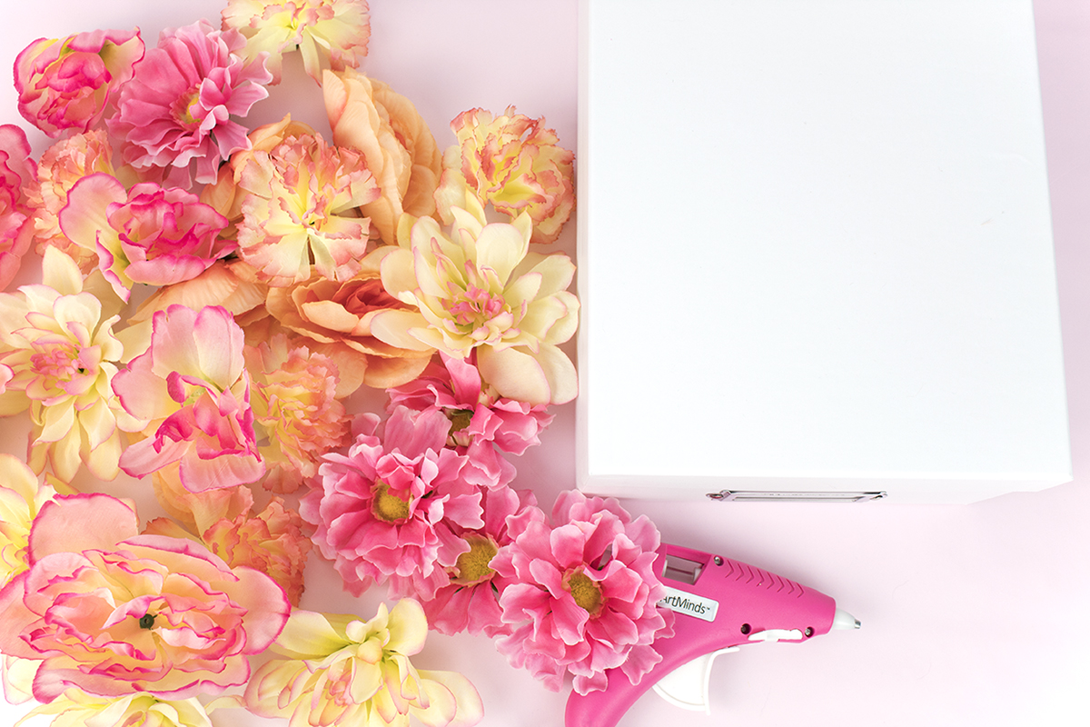 Need a gift box or bridesmaid box that'll put a spring in her step? Look no further! This box is easy and affordable, plus it's a great conversation piece! Click for the full how-to, plus some tips on what to put inside.