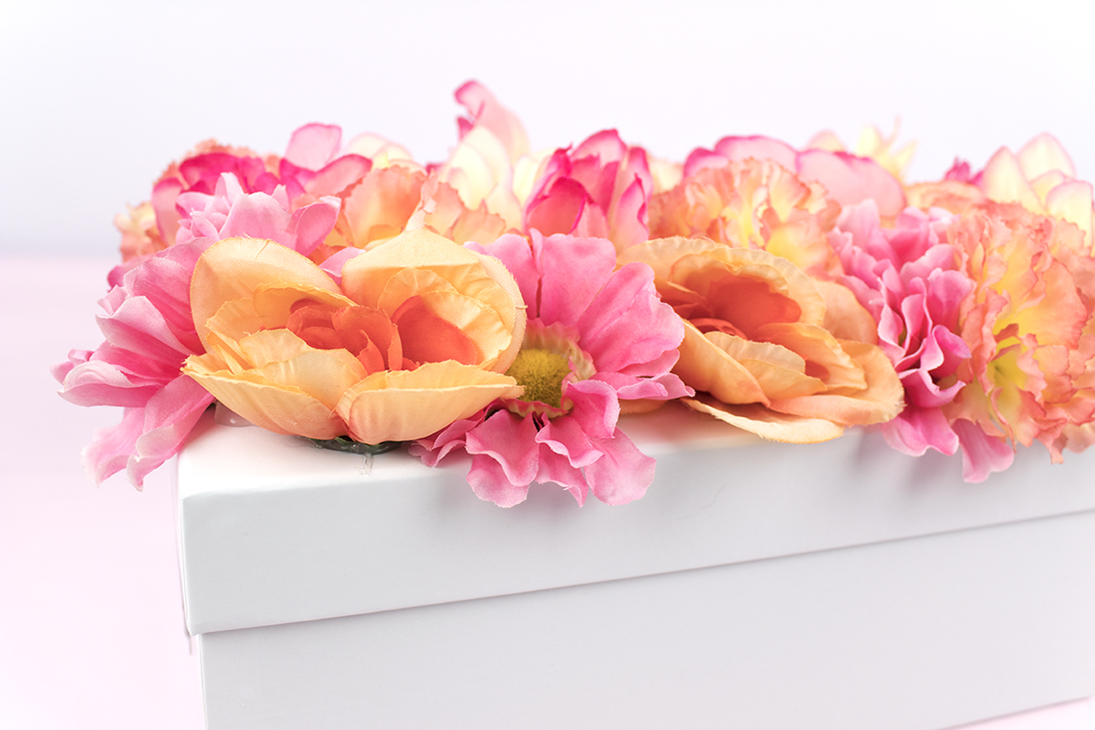 Need a gift box or bridesmaid box that'll put a spring in her step? Look no further! This box is easy and affordable, plus it's a great conversation piece! Click for the full how-to, plus some tips on what to put inside.